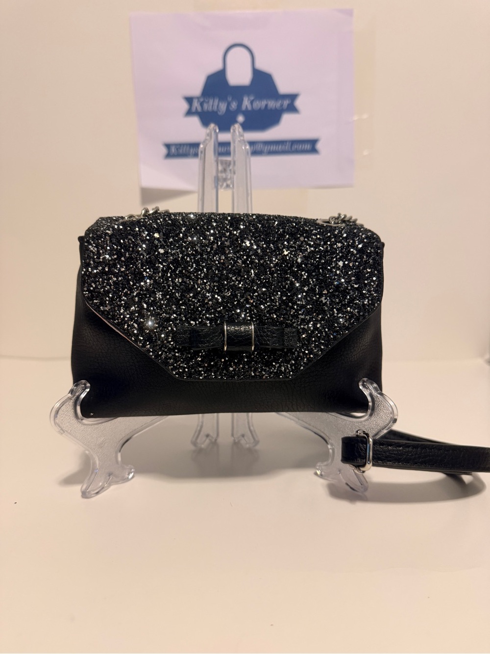 Candie’s Black Glitter Flap Crossbody Bag with Bow Accent